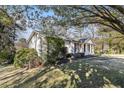 A charming one-story home surrounded by lush greenery, nestled in a serene neighborhood at 4433 Canary Ct, Lithia Springs, GA 30122