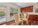 Cozy breakfast nook with natural light and wood cabinets, perfect for casual dining at 4540 Hastings Dr, Cumming, GA 30041