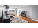 Cozy living room featuring a hardwood floor and a city view window at 2479 Peachtree Ne Rd # 1606, Atlanta, GA 30305