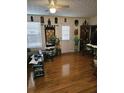 Comfortable living room with hardwood floors and ceiling fan at 315 Saratoga Pl, Riverdale, GA 30296