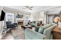 Bright living room with fireplace, neutral tones, and ample seating for comfortable living at 1450 Donald Lee Hollowell Nw Pkwy, Atlanta, GA 30318