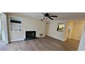 Bright living room featuring wood flooring and a classic fireplace at 1701 Augusta Se Dr # 1701, Marietta, GA 30067