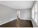 Living room featuring hardwood floors and modern gray paint at 5273 Crystal Ln, Atlanta, GA 30349