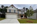 Beautiful two-story house with a brick facade, an attached two-car garage, and a landscaped front yard at 376 Waterbluff Dr, Mableton, GA 30126