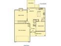 A clear layout of the first floor with a two car garage, kitchen, living spaces, and patio at 372 Waterbluff Dr, Mableton, GA 30126