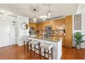 Bright kitchen featuring stainless steel appliances, granite countertops, and a functional breakfast bar with seating at 711 Cosmopolitan Ne Dr # 523, Atlanta, GA 30324