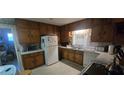Functional kitchen design with ample cabinet space and standard appliances at 2572 Tyler Way, Decatur, GA 30032
