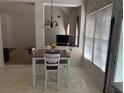 Cozy dining area with table, chairs, and natural light at 275 Rose Ivy Ct, Lawrenceville, GA 30043