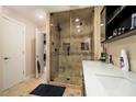 Modern bathroom featuring a glass shower and double sink vanity at 3501 Roswell Ne Rd, Atlanta, GA 30305