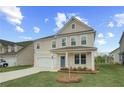 Attractive two-story home with well-maintained lawn and covered front porch at 537 Teversham Dr, Mcdonough, GA 30253