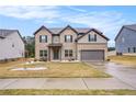 Beautiful two-story brick home with a two-car garage on a well manicured lot at 224 Osier Dr, Mcdonough, GA 30252