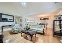 Open concept living room with hardwood floors and vaulted ceilings at 1312 Birch Ct, Lithonia, GA 30058