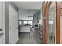 Inviting foyer opens to a living room with a fireplace and wood floors at 802 Towering Pine Trl, Lawrenceville, GA 30045