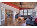 Open-concept living space blending kitchen and living areas with hardwood floors and plenty of natural light at 24 Allatoona Landing Rd #29, Cartersville, GA 30121