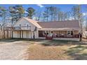 Inviting home with a large front porch and well-maintained landscaping at 998 Sisley Trl, White, GA 30184