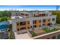 Stunning rooftop condo with an outdoor kitchen, fireplace, and comfortable lounging areas in a vibrant neighborhood at 112 Rogers Ne St # 503, Atlanta, GA 30317