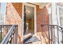 Inviting entryway with hardwood floors and open floor plan, bathed in natural light from nearby windows at 5210 Davenport Pl, Roswell, GA 30075