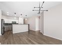 Open concept living space with modern kitchen and dining area at 1955 Nocturne Dr # 3301, Alpharetta, GA 30009