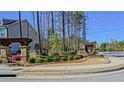 Stone monument sign with manicured landscaping welcomes you to the Central Park community at 3489 Central Park Dr, Loganville, GA 30052