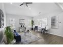 Bright and airy living room featuring hardwood floors and large windows at 652 Hugh Sw St, Atlanta, GA 30310