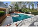 Community pool view with clear water and ample surrounding space for relaxation at 23 Paces West Dr, Atlanta, GA 30327