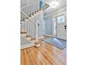 Inviting foyer with hardwood floors, a staircase, and natural light at 1658 East Clifton Rd, Atlanta, GA 30307