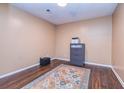 Bedroom with dark wood floors and neutral walls at 409 Hunting Ridge Way, Ellenwood, GA 30294