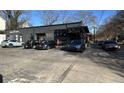Modern black commercial building featuring large windows and nearby parking at 92 Ormond Se St, Atlanta, GA 30315