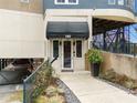 A charming front entrance with awning and well-maintained landscaping creates a welcoming first impression at 140 Alden Nw Ave # 201, Atlanta, GA 30309