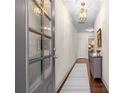 Inviting hallway with hardwood floors, modern lighting, and neutral decor at 2468 Skyland Ne Dr # 32, Atlanta, GA 30319