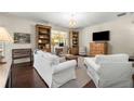 Bright living room featuring hardwood floors, stylish furnishings, and a cozy atmosphere at 2468 Skyland Ne Dr # 32, Atlanta, GA 30319