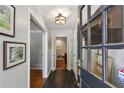 Welcoming entryway with slate tile flooring, stylish lighting, and decorative wall art at 205 Glencourtney Dr, Sandy Springs, GA 30328