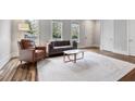 Comfortable living area with hardwood floors, stylish furniture, and abundant natural light at 1228 Church St, Decatur, GA 30030