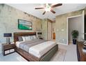 Comfortable bedroom with modern lighting, neutral tones, and a large window for natural light at 215 Semel Nw Dr # 466, Atlanta, GA 30309