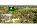 Scenic aerial view showcasing property's proximity to the prestigious East Lake Golf Club with lush trees and neighborhood overview at 576 Quillian Ave, Decatur, GA 30032