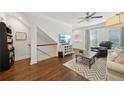 Comfortable living room with hardwood floors, stairs and lots of natural light at 1119 Glenridge Pl, Atlanta, GA 30342