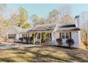 Charming single-story home boasting a well-maintained lawn and inviting curb appeal at 511 Laird Rd, Hiram, GA 30141
