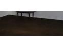The living room has neutral walls, carpeted flooring, and a small wooden table at 3788 Travis Trce, Decatur, GA 30032
