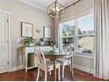 Cozy breakfast nook with lots of natural light, table and chairs at 15 Azalea Lakes Ct, Dallas, GA 30157
