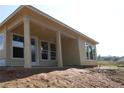 View of the back porch with large supporting beams at 2055 Ripple Park Bend, Canton, GA 30114