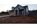 Beautiful single-Gathering home featuring a two-car garage and contemporary design in a peaceful neighborhood at 2055 Ripple Park Bnd, Canton, GA 30114