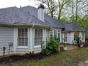 Nice backyard features a mixture of shade, mature trees, and a small patio at , Stone Mountain, GA 30087
