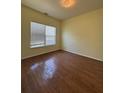 Bright bedroom with natural light and hardwood floors at 257 Brookview Dr, Riverdale, GA 30274