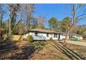 This beautiful white house has a lovely yard, making it an inviting and cozy home at 4378 Glenwood Pkwy, Decatur, GA 30032