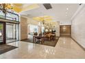 A stunning building lobby featuring lots of seating, light and elegant floors at 300 Peachtree Ne St # 17H, Atlanta, GA 30308
