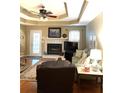 Comfortable living room featuring hardwood floors and a fireplace at 3503 Saddlebrook Dr, Loganville, GA 30052