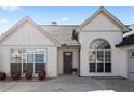 Inviting front entrance features a new door, large windows, and charming curb appeal at 5330 Maltdie Ct, Sugar Hill, GA 30518