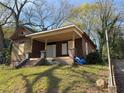 Exterior of home with grassy yard at 707 Dill Sw Ave, Atlanta, GA 30310