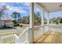 Inviting front porch featuring white railing and ample space, perfect for enjoying the outdoors at 3298 Rangers Gate, Marietta, GA 30062
