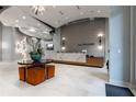 Elegant lobby featuring modern decor, a marble reception desk, and stylish seating at 250 Pharr Ne Rd # 2101, Atlanta, GA 30305